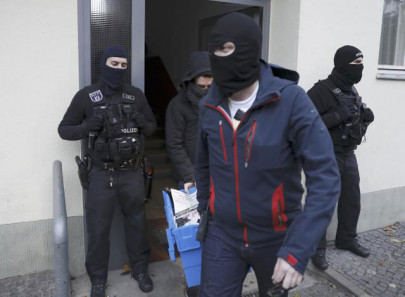 police raid mosques flats across germany as government bans militant group