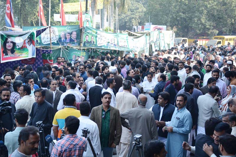 voters wait for their turn to cast their votes outside town hall lahore photo online