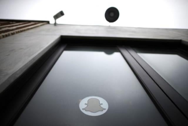 a security camera is seen over the door of snapchat 039 s headquarters in venice los angeles california october 13 2014 photo reuters