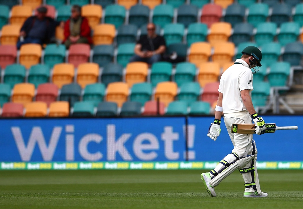 australia captain steve smith walks off the ground after being dismissed by kagiso rabada in hobart photo reuters david gray