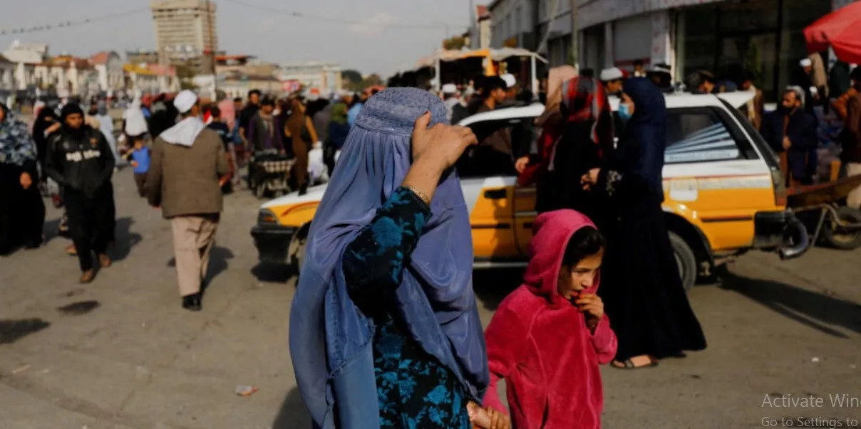 file photo an afghan woman and a girl walk in a street in kabul afghanistan november 9 2022 ali khara reuters file photo an afghan woman and a girl walk in a street in kabul afghanistan november 9 2022 ali khara reuters