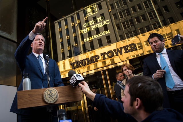 new york city mayor bill de blasio speaks to the press in front of trump tower after his meeting with president elect donald trump photo afp