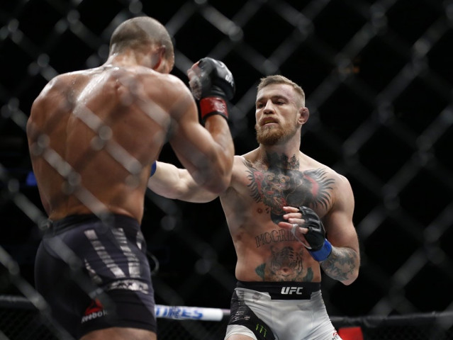 conor mcgregor r fights eddie alvarez at madison square garden photo reuters adam hunger usa today sports conor mcgregor r fights eddie alvarez at madison square garden photo reuters adam hunger usa today sports