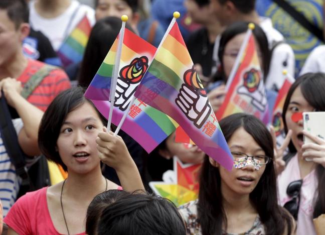 participants take part in a rally demanding the taiwanese government to legalize same sex marriage in front of the ruling nationalist kuomintang party headquarters in taipei taiwan july 11 2015 reuters pichi chuang