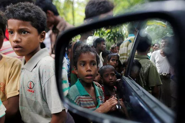 rohingya muslim boys stand in u shey kya village outside maungdaw in rakhine state myanmar on oct 27 2016 photo reuters rohingya muslim boys stand in u shey kya village outside maungdaw in rakhine state myanmar on oct 27 2016 photo reuters