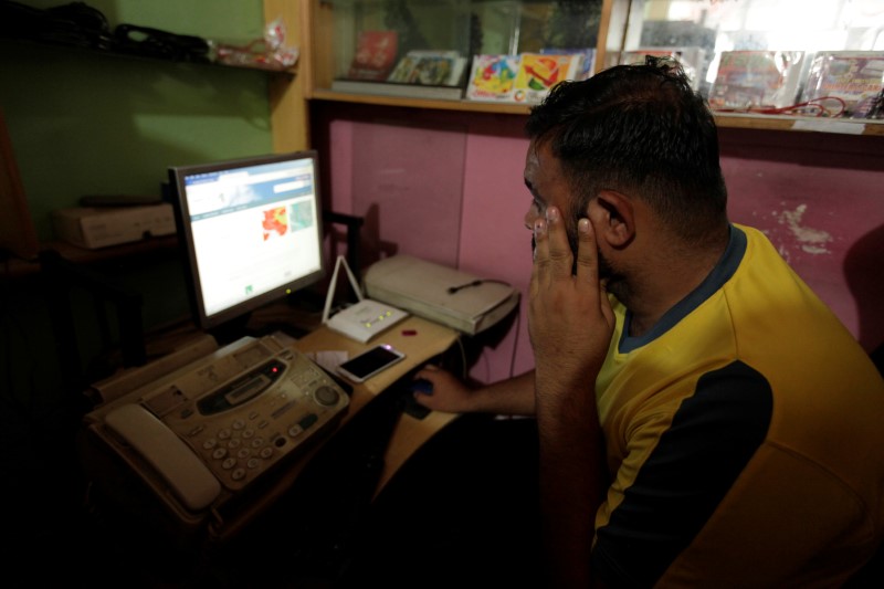 a man explores social media on a computer at an internet club in islamabad pakistan august 11 2016 picture taken august 11 2016 reuters faisal mahmood