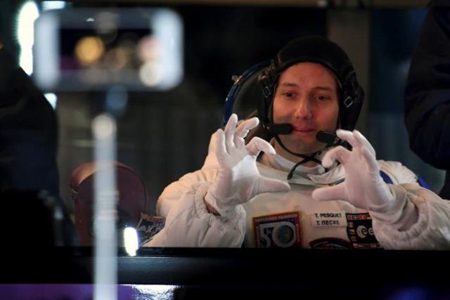 the international space station iss crew member thomas pesquet of france gestures as he sits in a bus before boarding spacecraft at the baikonur cosmodrome kazakhstan 17 november 2016 photo reuters