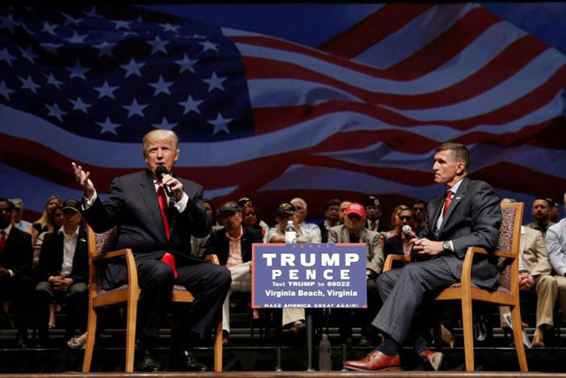 republican presidential nominee donald trump l speaks along side retired us army lieutenant general michael flynn during a campaign town hall meeting in virginia beach virginia us september 6 2016 photo reuters