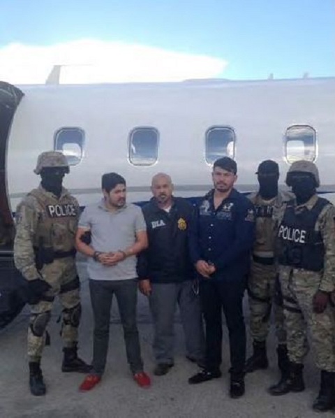 efrain antonio campo flores 2nd from l and franqui fancisco flores de freitas stand with law enforcement officers photo reuters