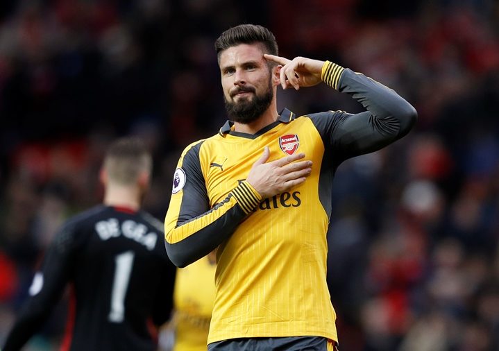 olivier giroud celebrates after the game against manchester united on november 19 2016 photo reuters