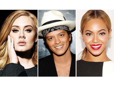 how adele beyonc and bruno mars fly high while lying low