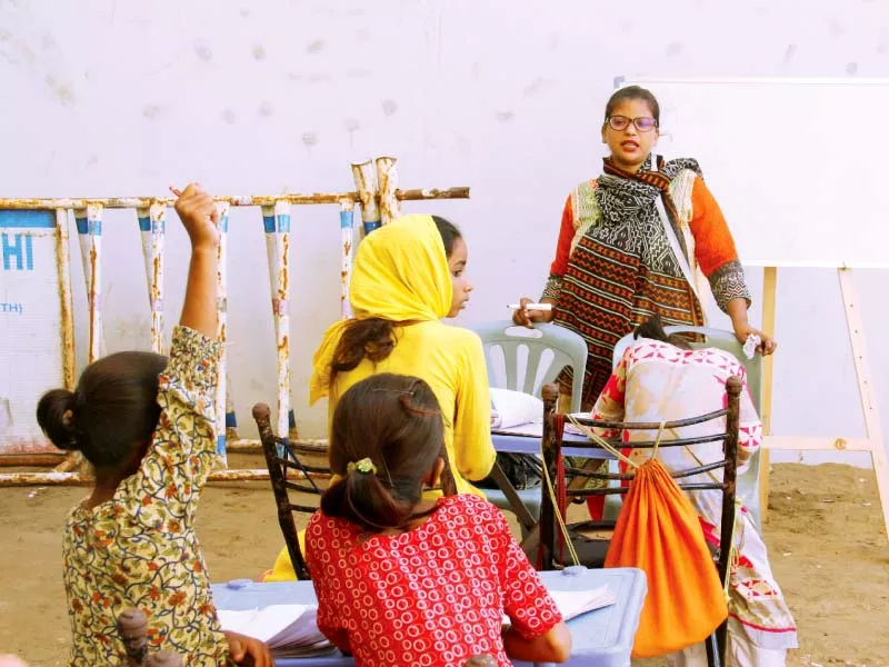 students being taught at the street school established by brother sister duo shireen and hasan zafar photo ayesha mir express students being taught at the street school established by brother sister duo shireen and hasan zafar photo ayesha mir express