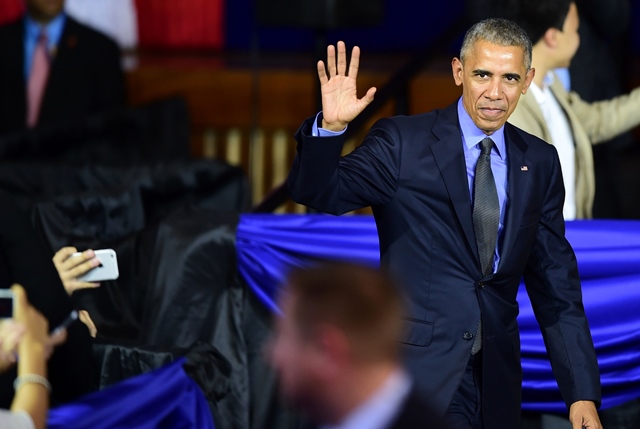 us president barack obama waves upon arrival for a meeting with youngsters at the pontifical catholic university of peru photo afp