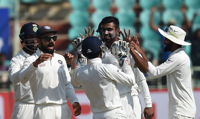 india 039 s ravichandran ashwin 2nd r celebrates the wicket of england 039 s ben duckett with captain virat kohli 2nd l and teammates during the last day of the second test cricket match between india and england at the dr y s rajasekhara reddy aca vdca cricket stadium in vishakhapatnam on november 21 2016 photo afp india 039 s ravichandran ashwin 2nd r celebrates the wicket of england 039 s ben duckett with captain virat kohli 2nd l and teammates during the last day of the second test cricket match between india and england at the dr y s rajasekhara reddy aca vdca cricket stadium in vishakhapatnam on november 21 2016 photo afp