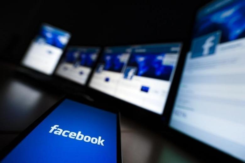 the loading screen of the facebook application on a mobile phone is seen in this photo illustration taken in lavigny may 16 2012 photo reuters