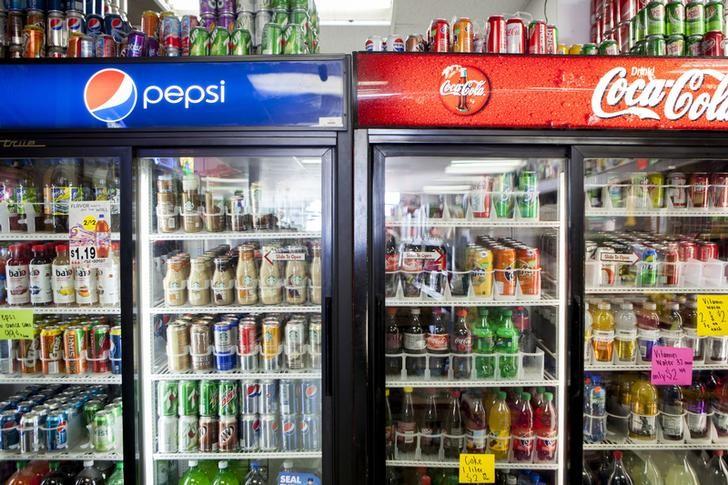 cans of soda are displayed in a case at kwik stops liquor in san diego california february 13 2014 photo reuters