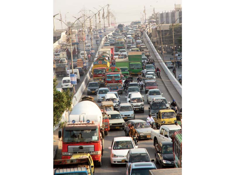 a view of the traffic jam at the baloch colony bridge on tuesday traffic jams were witnessed in most parts of the city due to the ninth ideas exhibition being held at expo centre photo athar khan express