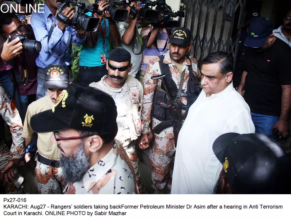 dr asim hussain in custody of rangers after an atc hearing in karachi on august 27 2015 photo online dr asim hussain in custody of rangers after an atc hearing in karachi on august 27 2015 photo online