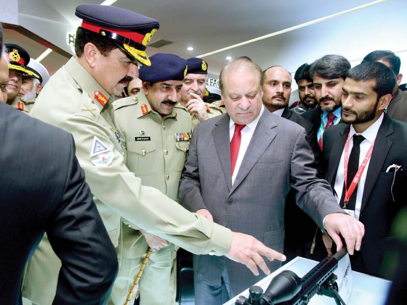 pm nawaz and gen raheel inspect a pof made sniper rifle on display at ideas 2016 photo inp