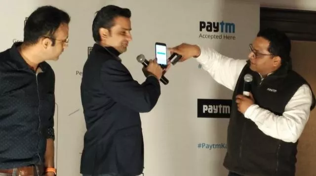 paytm founder and ceo vijay shekhar sharma right demonstrates how paytm s new product works photo tech in asia paytm founder and ceo vijay shekhar sharma right demonstrates how paytm s new product works photo tech in asia