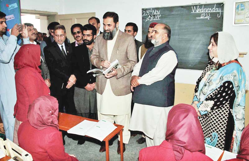 the minister meeting students at the school in humak photo online