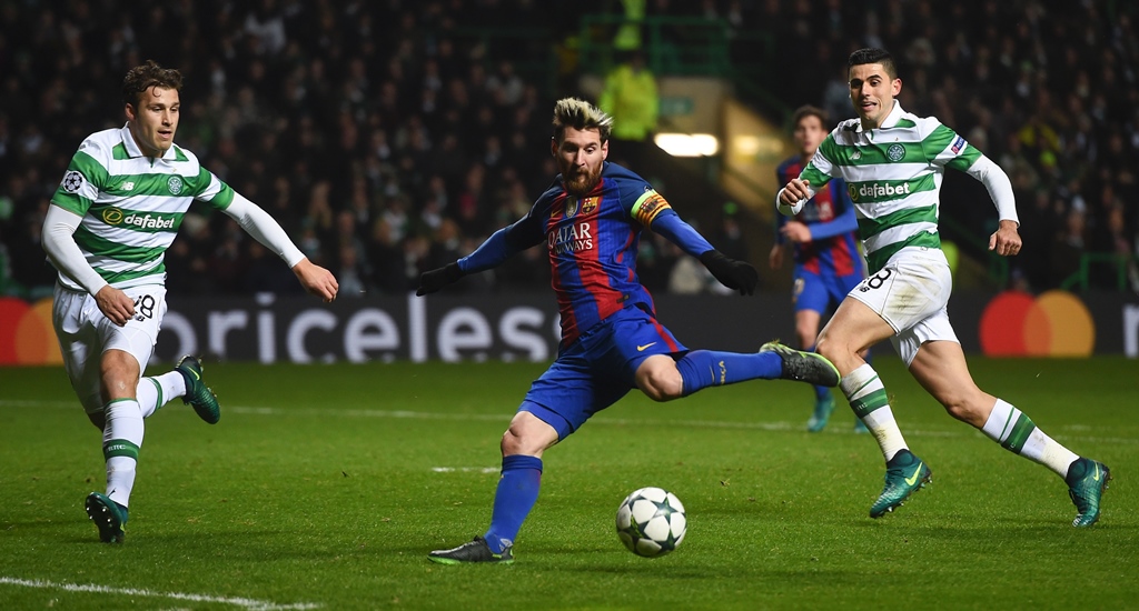 lionel messi r shoots to score the opening goal at celtic park in glasgow on november 23 2016 photo afp paul ellis