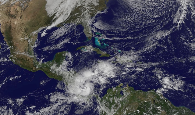 tropical storm otto was forecast to strengthen into a hurricane with winds over 119 kilometers 74 miles per hour when it makes landfall on thursday the us national hurricane center said photo afp