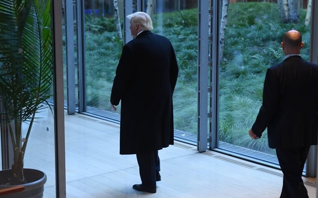 us president elect donald trump leaves after a meeting at the new york times on november 22 2016 in new york us president elect trump said tuesday he has an open mind about pulling out of world climate accords and admitted global warming may be in some way linked to human activity quot i think there is some connectivity some something it depends on how much quot he told a panel of new york times journalists photo afp us president elect donald trump leaves after a meeting at the new york times on november 22 2016 in new york us president elect trump said tuesday he has an open mind about pulling out of world climate accords and admitted global warming may be in some way linked to human activity quot i think there is some connectivity some something it depends on how much quot he told a panel of new york times journalists photo afp