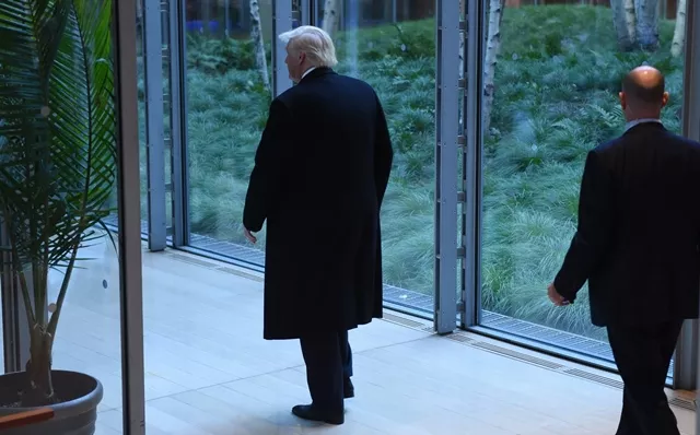 us president elect donald trump leaves after a meeting at the new york times on november 22 2016 in new york us president elect trump said tuesday he has an open mind about pulling out of world climate accords and admitted global warming may be in some way linked to human activity quot i think there is some connectivity some something it depends on how much quot he told a panel of new york times journalists photo afp us president elect donald trump leaves after a meeting at the new york times on november 22 2016 in new york us president elect trump said tuesday he has an open mind about pulling out of world climate accords and admitted global warming may be in some way linked to human activity quot i think there is some connectivity some something it depends on how much quot he told a panel of new york times journalists photo afp