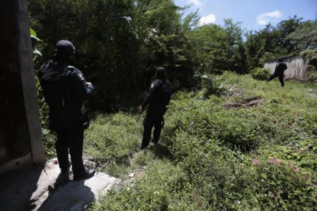 mass grave found in restive southern mexican state photo reuters
