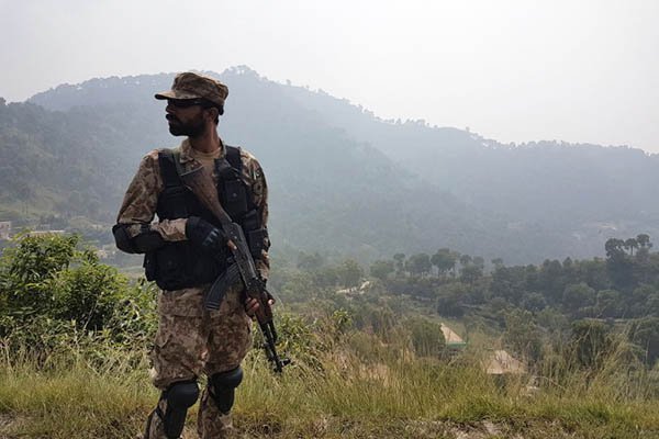 a pakistani soldier patrols a village in district bhimber near the line of control loc in azad kashmir on october 1 2016 photo afp