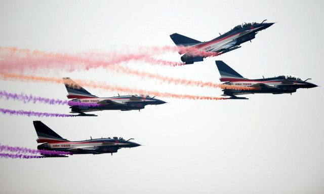 j 10 fighter jets of the bayi aerobatic team of pla 039 s peoples liberation army air force performing during the 10th china airshow photo afp j 10 fighter jets of the bayi aerobatic team of pla 039 s peoples liberation army air force performing during the 10th china airshow photo afp