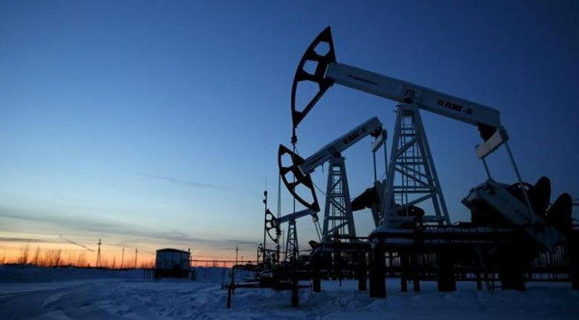 pump jacks are seen at the lukoil company owned imilorskoye oil field as the sun sets outside the west siberian city of kogalym russia photo reuters