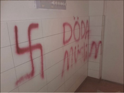 attackers burst into stockholm mosque paint swastikas