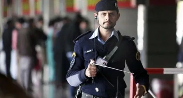 a file photo shows an airport security force asf official