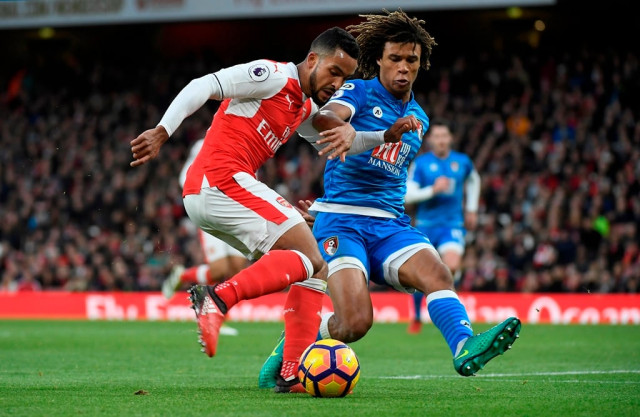arsenal 039 s theo walcott in with bournemouth 039 s nathan ake photo reuters arsenal 039 s theo walcott in with bournemouth 039 s nathan ake photo reuters