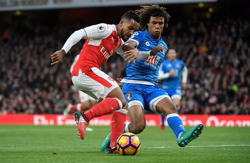 arsenal 039 s theo walcott in with bournemouth 039 s nathan ake photo reuters arsenal 039 s theo walcott in with bournemouth 039 s nathan ake photo reuters