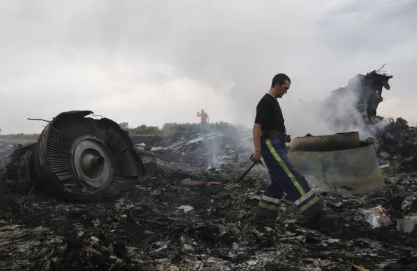 emergencies ministry member walks at the site of a malaysia airlines boeing 777 plane crash near the settlement of grabovo in the donetsk region photo reuters emergencies ministry member walks at the site of a malaysia airlines boeing 777 plane crash near the settlement of grabovo in the donetsk region photo reuters