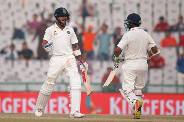 india 039 s virat kohli and parthiv patel r celebrate after winning the match against england on november 29 2016 photo reuters india 039 s virat kohli and parthiv patel r celebrate after winning the match against england on november 29 2016 photo reuters