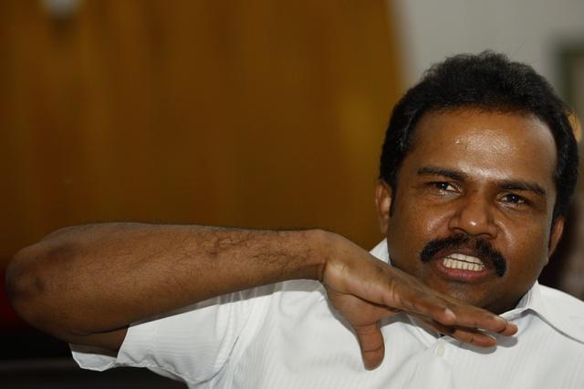 vinayagamoorthi muralitharan widely known as col karuna speaks during an interview in colombo on november 12 2008 photo reuters