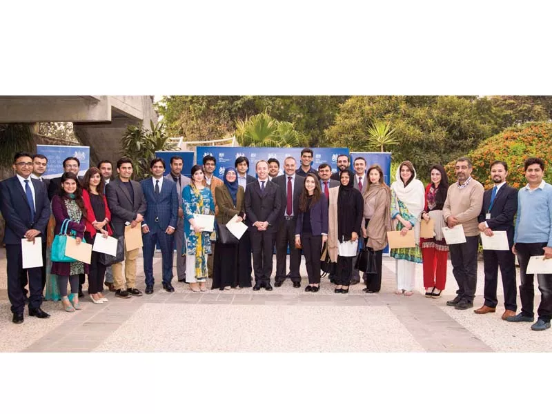 some of the chevening alumni gathered around the high commissioner photo express some of the chevening alumni gathered around the high commissioner photo express