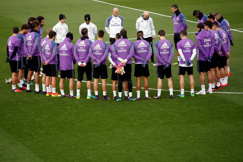 real madrid players observe a minute of silence photo reuters juan medina