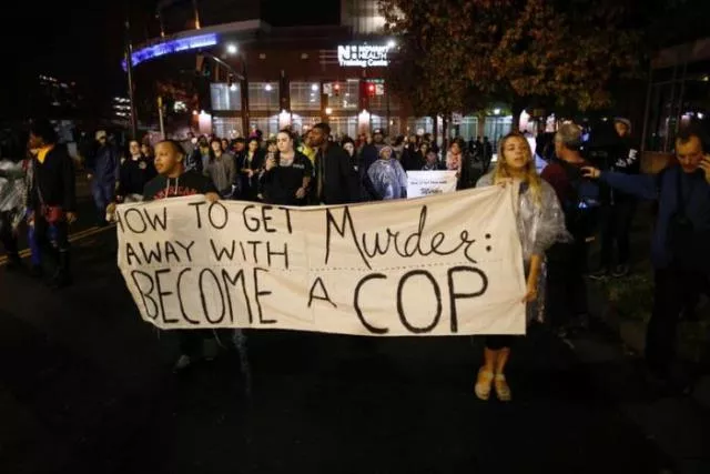 protesters march through uptown charlotte north carolina november 30 2016 following the decision of the district attorney not to press criminal charges against police in the shooting of keith scott photo reuters protesters march through uptown charlotte north carolina november 30 2016 following the decision of the district attorney not to press criminal charges against police in the shooting of keith scott photo reuters