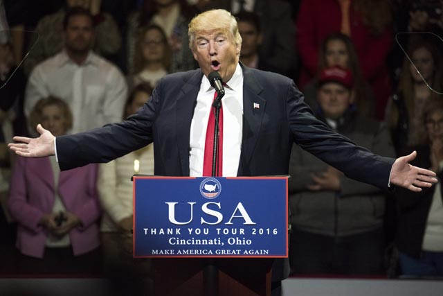 president elect donald trump speaks during a stop at us bank arena on december 1 2016 in cincinnati ohio photo afp