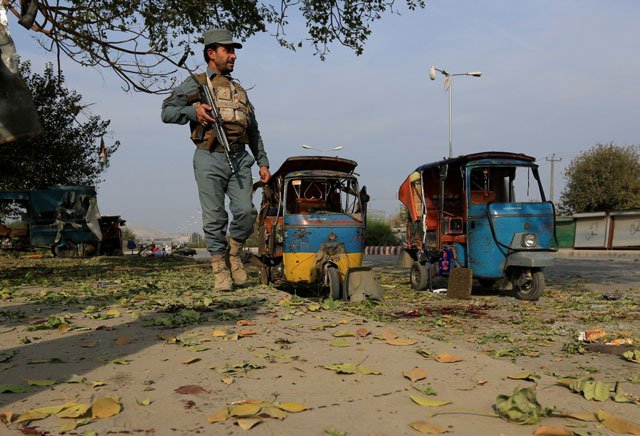 an afghan policeman stands guard at the site of blast in jalalabad city afghanistan november 25 2016 photo reuters