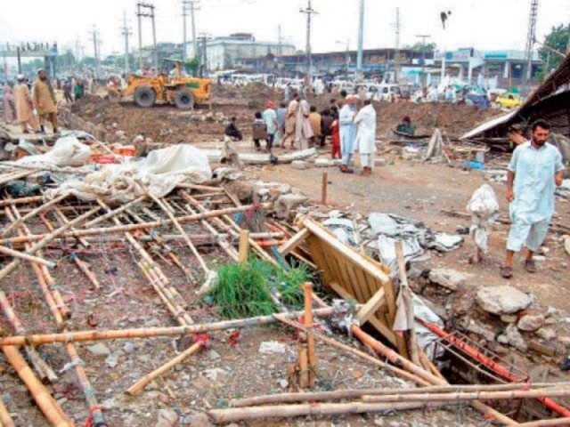 the remains of a few illegal kiosks that were razed earlier this year photo file the remains of a few illegal kiosks that were razed earlier this year photo file