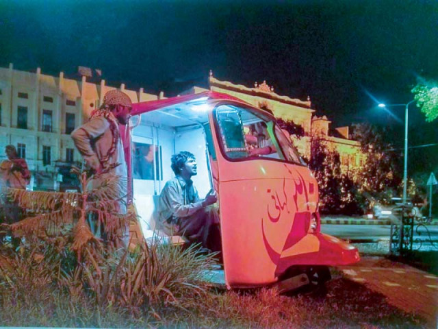 a man records his story at a storytelling booth in lahore photo express a man records his story at a storytelling booth in lahore photo express