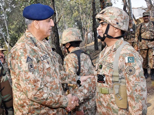 gen qamar interacts with troops at a forward post during his visit to the loc photo inp gen qamar interacts with troops at a forward post during his visit to the loc photo inp
