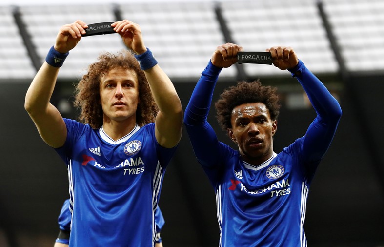 chelsea 039 s willian celebrates scoring their second goal against manchester city on december 2 2016 with david luiz as they hold armbands in respect for the victims of the colombia plane crash containing the chapecoense players photo reuters