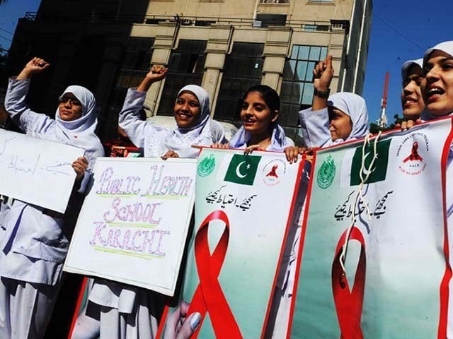 pakistani nurses chant slogans during a rally to mark world aids day photo afp